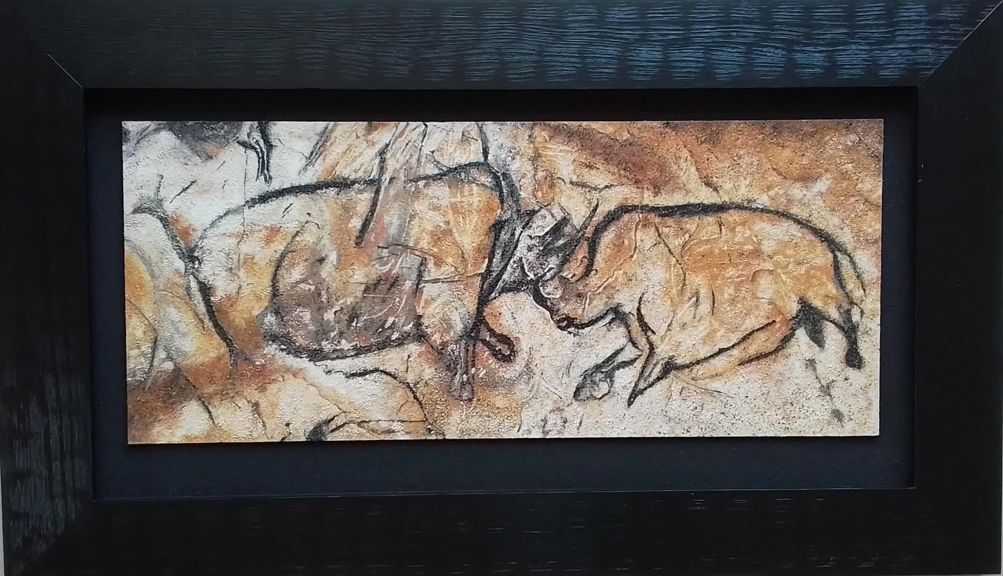 Les Rhinocéros s’affrontent, œuvre en sable naturel de Gérard Robin